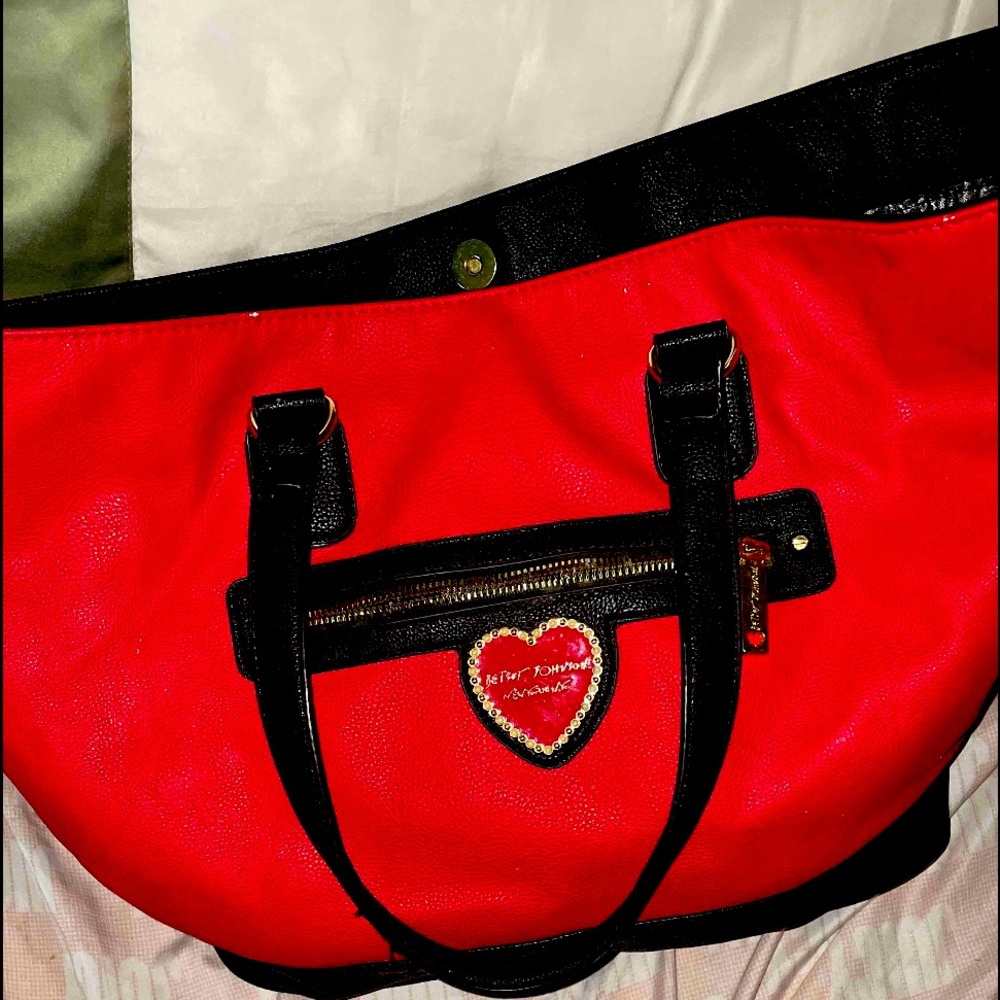 My favorite Betsey Johnson purse in the world. It’s big and red and can fit ALOT